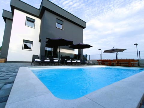 Property building, Patio, Swimming pool