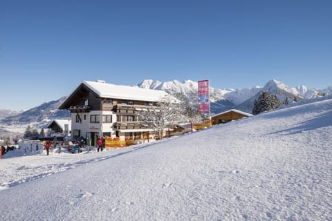 Property building, Facade/entrance, Day, Natural landscape, Winter, Mountain view