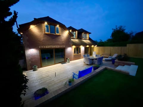 Property building, Patio, Night, Seating area