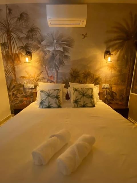 Bed, Photo of the whole room, Bedroom, towels, air conditioner