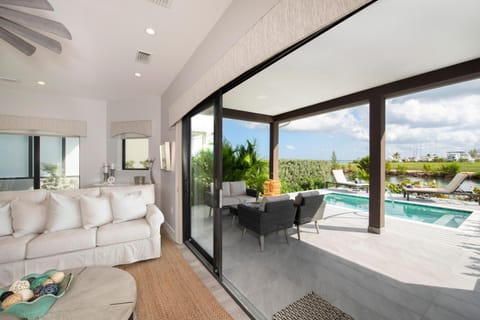 Patio, Day, Natural landscape, View (from property/room), Balcony/Terrace, Living room, Seating area, Dining area, Pool view, Swimming pool, sunbed