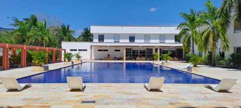 Property building, Day, Pool view, Swimming pool, sunbed