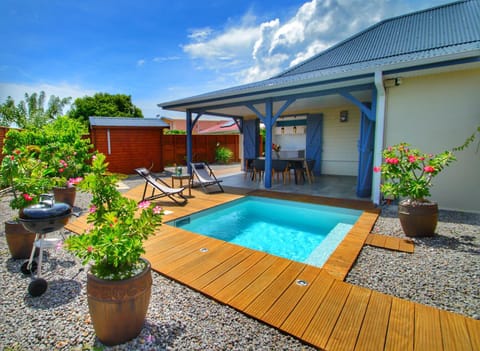 Patio, BBQ facilities, Swimming pool, sunbed