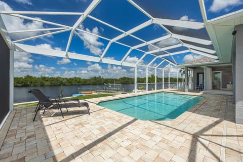 Heaven Found! Stunning River Views & Pool - Villa Island Sunset - Roelens Vacations House in North Fort Myers