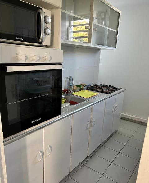 Kitchen or kitchenette, oven, stove