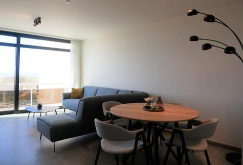 Property building, Living room, Seating area, Dining area