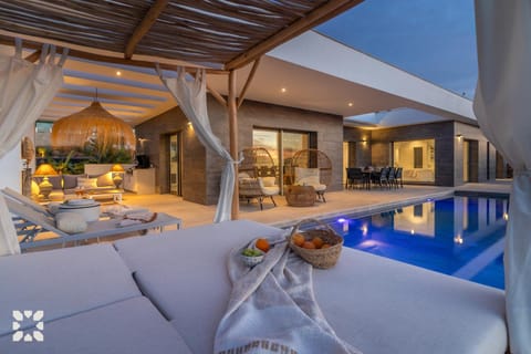 Patio, Living room, Seating area, Pool view, Swimming pool, sunbed