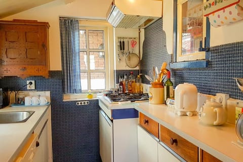 Kitchen or kitchenette, stove, kitchen