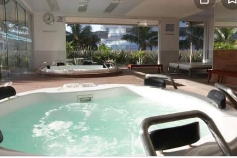 O MELHOR Resort em Riviera São Lourenço 500m da praia de Riviera, com SPA, piscinas aquecidas externa e interna, cinema, restaurantes e bar! MÓDULO 8 Condo in Bertioga