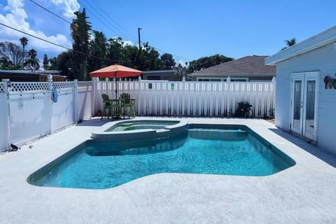 Sunset Retreat -Walk to Beach w/ Private Pool + Grill House in North Redington Beach