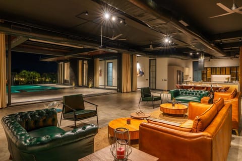 Living room, Seating area, Pool view