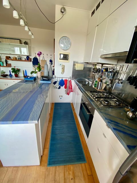 Kitchen or kitchenette, dishwasher, microwave, oven