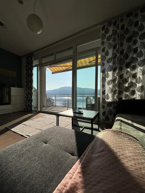 Natural landscape, View (from property/room), Living room, Seating area, Mountain view