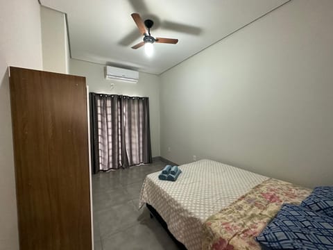 Bed, Photo of the whole room, Bedroom, fireplace, wardrobe, air conditioner