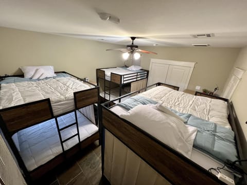 Bed, Seating area, Bedroom, bunk bed, internet, microwave, air conditioner