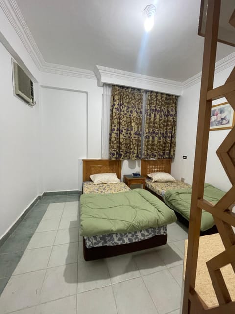 A cozy room in 2 bedrooms apartment with a back yard Campground/ 
RV Resort in Sharm El-Sheikh