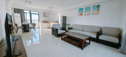 Living room, Seating area, kitchen, air conditioner