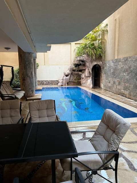 Property building, Patio, View (from property/room), Other, Swimming pool, furniture, sunbed