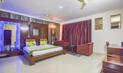 Bed, Seating area, Bedroom