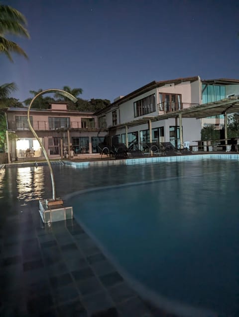 Property building, Night, Pool view, Swimming pool, sunbed