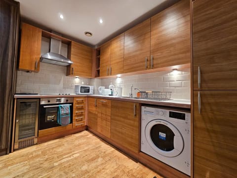 Kitchen or kitchenette, dishwasher, minibar, oven, pet friendly, stove, toaster, washing machine, dryer