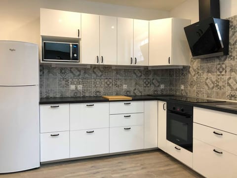 Kitchen or kitchenette, stove