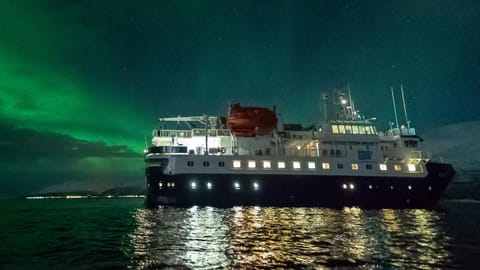 24hrs Northern Lights & Whale Watching Cruise Docked boat in Tromso