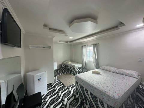 Communal lounge/ TV room, Bed, TV and multimedia, Photo of the whole room, Bedroom, towels, air conditioner