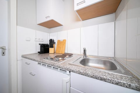 Kitchen or kitchenette, stove