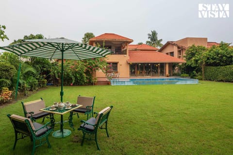 StayVista's Ishva Bungalow - Massive Pool, Sprawling Lawn & Indoor-Outdoor Games Chalet in Kolkata