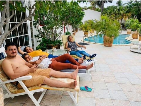 Patio, Pool view, Swimming pool, group of guests