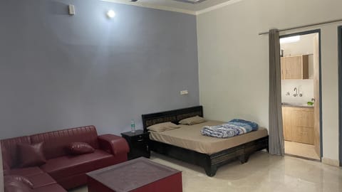 Bed, Living room, Seating area, Bedroom