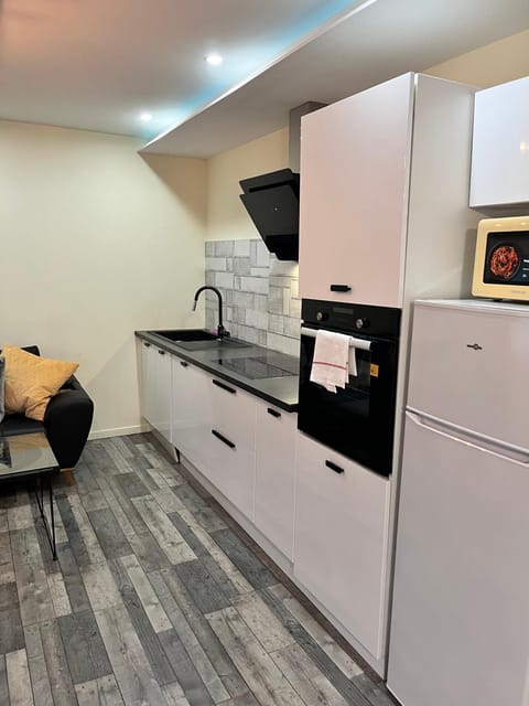 Kitchen or kitchenette, Seating area, dishwasher, microwave, oven, stove