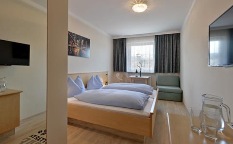 Bed, Seating area, Bedroom