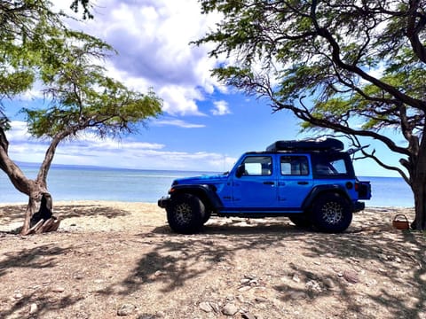 Embark on a journey through Maui with Aloha Glamp's jeep and rooftop tent allows you to discover diverse campgrounds, unveiling the island's beauty from unique perspectives each day Luxury tent in Maui