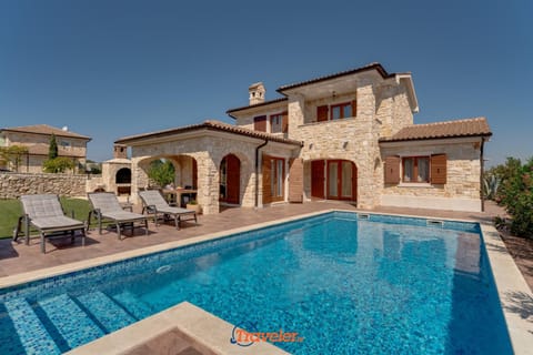 Romantic villa with a large pool and garden in a quiet area - by TRAVELER tourist agency Krk ID 2158 Villa in Krk