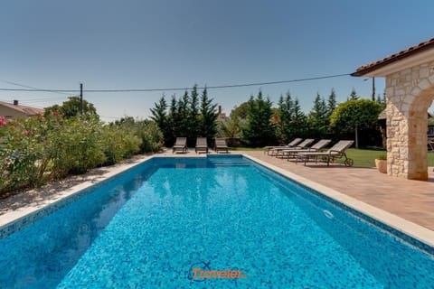 Romantic villa with a large pool and garden in a quiet area - by TRAVELER tourist agency Krk ID 2158 Villa in Krk