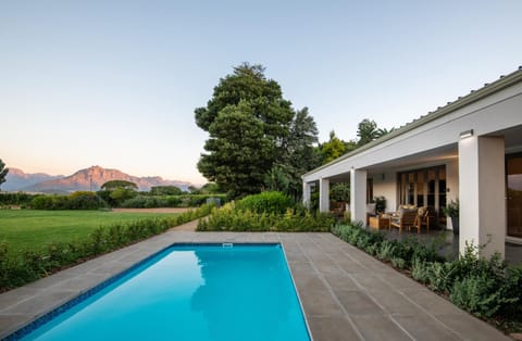 Property building, Patio, Natural landscape, Garden, Garden view, Mountain view, Pool view, Swimming pool