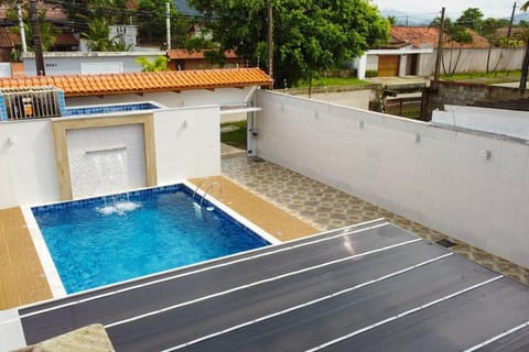 Casa alto padrão em Itanhaém, piscina com cascata, led e hidromassagem House in Itanhaém