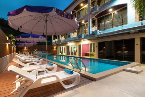 Property building, Pool view, Swimming pool, sunbed