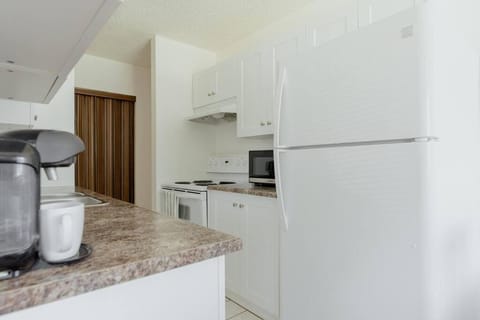 HOMEY 1BR Near NLRHC Corporate Rental WiFi Condo in Fort McMurray