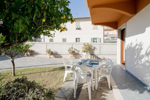 Property building, Patio, Dining area, Garden view