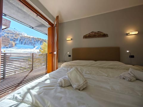 Hostdomus - Suite Les Etoiles Condo in Sestriere