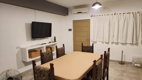 Communal lounge/ TV room, Kitchen or kitchenette, Dining area, air conditioner