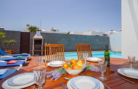 Patio, Seating area, Dining area, Pool view, Swimming pool