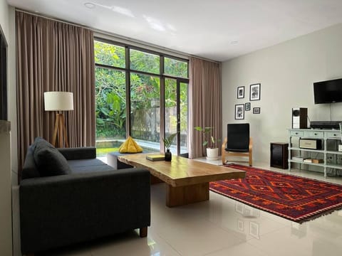 TV and multimedia, Living room, Seating area, Garden view, Pool view, Area and facilities