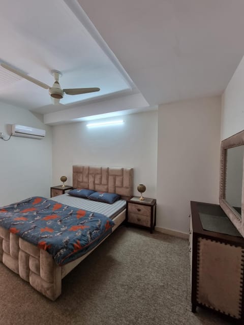 Three Bed Attached Bath Netflix Wifi Smart TV Parking Near Airport Condo in Islamabad