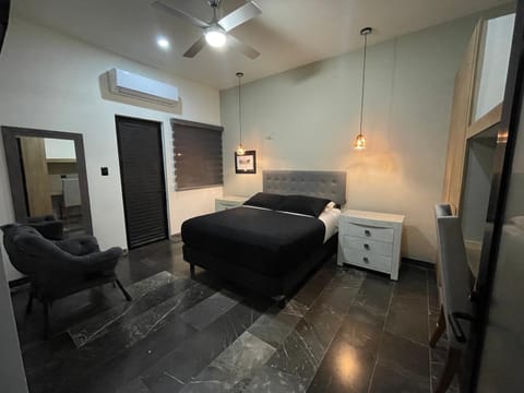 Bed, Photo of the whole room, Seating area, Bedroom, fireplace, air conditioner