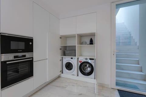 Kitchen or kitchenette, washing machine, dryer