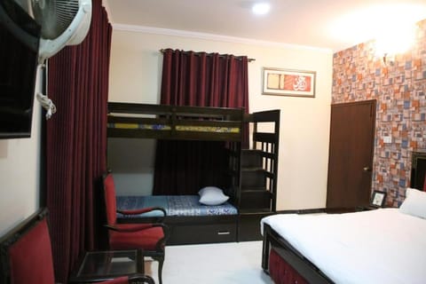 Bed, Photo of the whole room, Bedroom, bunk bed, towels, wardrobe